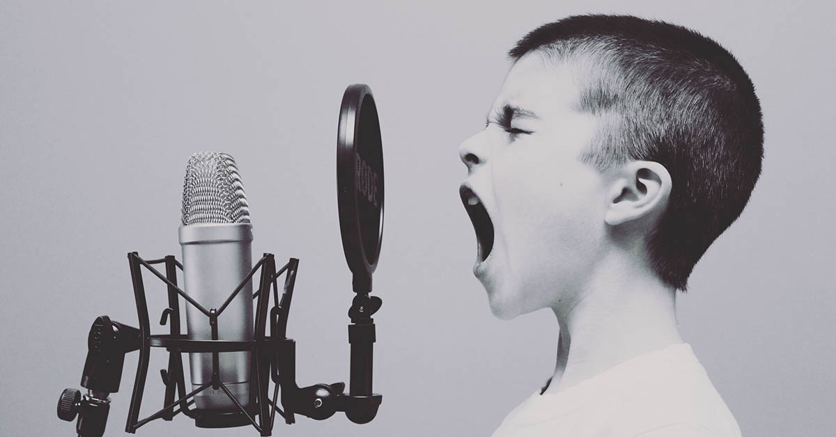 girl screaming in microphone